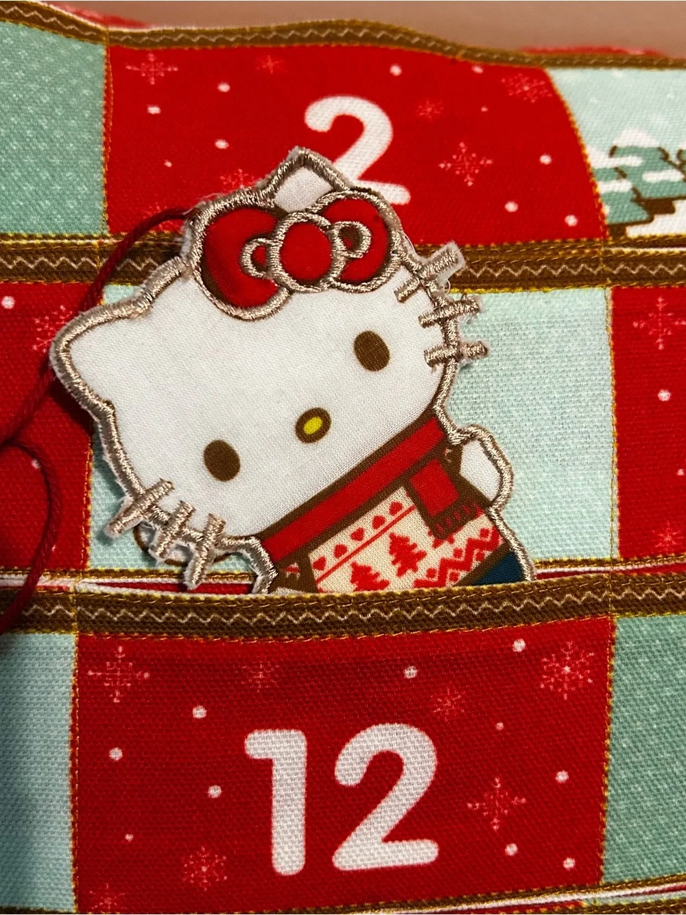Hello Kitty Red Advent Holiday Pillow with Numbered Pockets & Kitty Date Marker